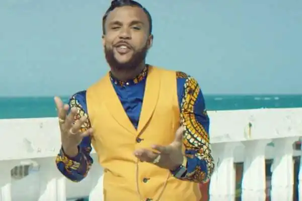 Jidenna Shares Photo Of Himself Posing Infront Of His Poor Looking Childhood Home In Enugu